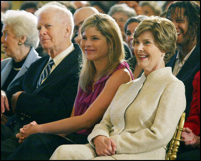Mrs. Laura Bush and daughter Jenna Hager listen to author Jan Brett during the National Book Festival Breakfast Saturday, Sept. 27, 2008, in the East Room of the White House.