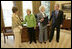 President George W. Bush and Laura Bush meet with Barbara de Marneff and Stephanie Copeland of Edith Wharton Restoration in Massachusetts, in the Oval Office Monday, May 2, 2005. The two women are two of the recipients of the 2005 Preserve America Presidential Award.
