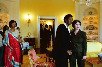 Laura Bush shows Jeannette Kagame, First Lady of the Republic of Rwanda, the view of Washington D. C from the residence Tuesday, March 4, 2003. White House photo by Susan Sterner.