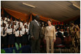 Mrs. Laura Bush and Ghana President John Agyekum Kufuor appear together at the launch of the Africa Education Initiative Textbooks Program Tuesday, Jan. 17, 2006 in Accra, Ghana.