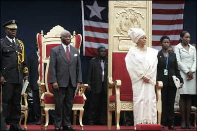Liberian President Ellen Johnson Sirleaf, right, stands with Vice President of Liberia Joseph Nyumah Boakiai in Monrovia, Liberia, at inauguration ceremonies of President Sirleaf, Jan. 16, 2006.