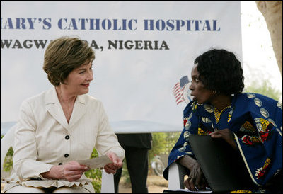 Laura Bush meets with a patient at St. Mary's Hospital in Gwagwalada, Nigeria, Wednesday, Jan. 18, 2006.