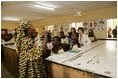 A teacher conducts a lesson at the Model Secondary School during a visit to the school by Laura Bush and her daughter Barbara Bush in Abuja, Nigeria Wednesday, Jan. 18, 2006.
