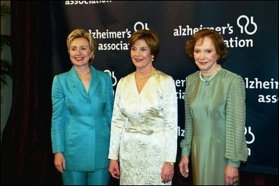 Laura Bush, accompanied by former First Ladies Hillary Clinton and Rosalyn Carter, attends the Alzheimer's Association Gala in Washington, D.C., March 24, 2004.