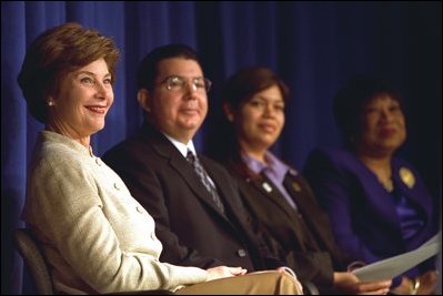 Laura Bush participates in the kickoff of The New Teacher Project for the Orleans Parish Schools at the University of New Orleans Wednesday, Feb. 19, 2003. Pictured with Mrs. Bush, from left, are Superintendent of the Orleans Parish Schools Tony Amato; Jeannine Ann Boutte, teacher; and Ellenese Brooks-Simms, the president of the Orleans Parish School Board. "Teachers shape the minds of our children and the destiny of our country," Mrs. Bush said. "Teachers fill children's lives with hope, learning and love, not just on school days, but every day of their life." White House photo by Susan Sterner.