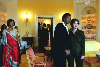 Laura Bush and Jeannette Kagame, First Lady of the Republic of Rwanda, look at the view of Washington, D.C. from the White House's Yellow Oval Room Tuesday, March 4, 2003. White House photo by Susan Sterner.