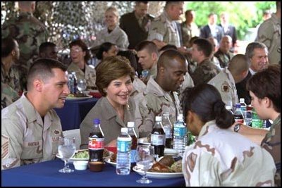 Laura Bush talks with military personnel during lunch at MacDill Air Force Base in Tampa, Fla., Wednesday, March 26, 2003. White House photo by Susan Sterner.