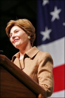 Laura Bush delivers remarks to U.S. soldiers and spouses during a visit to Ramstein Air Base Tuesday, Feb. 22, 2005 in Ramstein, Germany. Mrs. Bush thanked U.S. servicemen and women and the families that support them for their bravery and sacrifice.