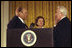 President Gerald R. Ford, with his wife, Betty, is sworn-in as the 38th President of the United States by U.S. Supreme Court Justice Warren Burger, Aug. 9, 1974, at the White House.