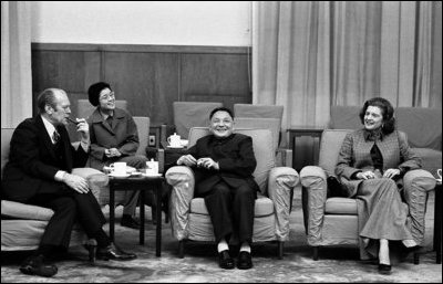 President Gerald R. Ford and Mrs. Betty Ford meet with Chinese Vice Premier Deng Xiao Ping, during an informal meeting Dec. 3, 1975 in Peking, China. Deng’s interpreter is seen background-left.