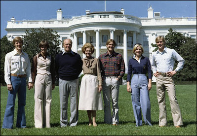 President Gerald R. Ford and Betty Ford on the South Lawn of the White House, Sept. 6, 1976, with their children, from left to right, Michael , his wife, Gayle, John , Susan and Steve.