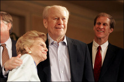 Former President Gerald R. Ford is embraced by his wife Betty Ford at a Gerald R. Foundation dinner in Rancho Mirage, Calif., June 6, 2005.