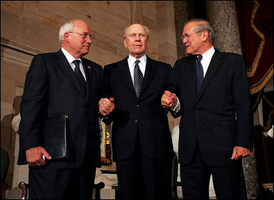 Former President Gerald R. Ford stands with his two White House Chiefs of Staff Vice President Dick Cheney and former Defense Secretary Donald Rumsfeld during a Gerald R. Ford Foundation awards dinner at the U.S. Capitol Aug. 9, 2004.