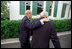 Former President Gerald R. Ford walks with Vice President Dick Cheney before a dinner for the Gerald R. Ford Foundation at the Vice President's residence at the U.S. Naval Observatory in Washington, D.C., June 4, 2001.