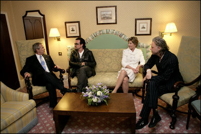 President George W. Bush, Bono, Laura Bush and Bob Geldof, far right, hold a working meeting on Africa at the G8 Summit in Gleneagles, Scotland, Wednesday, July 6, 2005.