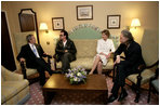 President George W. Bush, Bono, Laura Bush and Bob Geldof, far right, hold a working meeting on Africa at the G8 Summit in Gleneagles, Scotland, Wednesday, July 6, 2005.