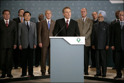 President George W. Bush and fellow G8 leaders stand behind Britain's Prime Minister Tony Blair Thursday, July 7, 2005, as he addressed the media at the Gleneagles Hotel in Auchterarder, Scotland, regarding the terrorist attacks that occured in London earlier in the day.