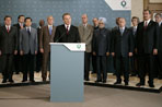 President George W. Bush stands with fellow G8 leaders as Britain’s Prime Minister Tony Blair issues a brief statement from Gleneagles Hotel in Auchterarder, Scotland, regarding the terrorist attacks Thursday, July 7, 2005, in London. Shortly after the statement, Prime Minister Blair departed the hotel to return to London for a security briefing.