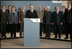 President George W. Bush stands with fellow G8 leaders as Britain’s Prime Minister Tony Blair issues a brief statement from Gleneagles Hotel in Auchterarder, Scotland, regarding the terrorist attacks Thursday, July 7, 2005, in London. Shortly after the statement, Prime Minister Blair departed the hotel to return to London for a security briefing.