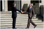 President George W. Bush is welcomed to Gleneagles Hotel in Auchterarder, Scotland, by Britain's Prime Minister Tony Blair Thursday, July 7, 2005, for the first G8 session.