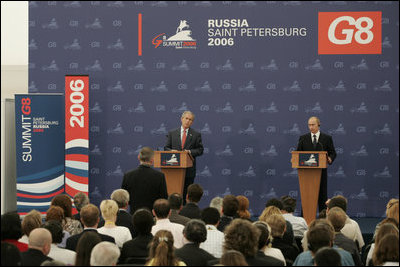 President George W. Bush and President Vladimir Putin of Russia, answer questions from reporters during a joint press availability at the International Media Center at the Konstantinovsky Palace Complex in Strelna, Russia, site of the 2006 G8 Summit.