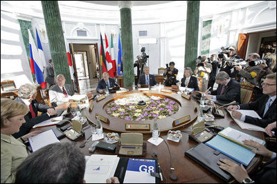 President George W. Bush participates in a working session at the G8 Summit in Strelna, Russia, Sunday, July 16, 2006.