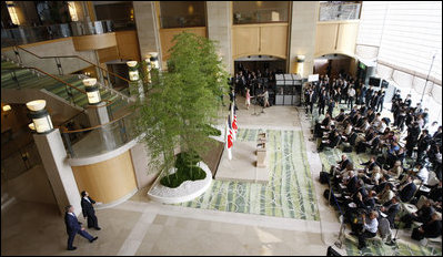 President George W. Bush and Prime Minister Yasuo Fukuda of Japan enter the Banquet Lobby at the Windsor Hotel Toya Resort and Spa Sunday, July, 6, 2008, for a joint press availability. The President and Mrs. Laura Bush arrived in Toyako on the northern Japanese Island of Hokkaido to attend the Group of Eight Summit.