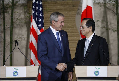 President George W. Bush and Prime Minister Yasuo Fukuda of Japan shake hands after their joint press availability Sunday, July 6, 2008, in Toyako on the northern Japanese Island of Hokkaido.