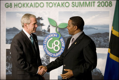 President George W. Bush and President Jakaya Kikwete exchange handshakes Monday, July 7, 2008, after meeting the media in Toyako, Japan, following the G-8 Working Session with the Africa Outreach Representatives.