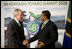 President George W. Bush and President Jakaya Kikwete exchange handshakes Monday, July 7, 2008, after meeting the media in Toyako, Japan, following the G-8 Working Session with the Africa Outreach Representatives.