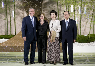 President George W. Bush and Mrs. Laura Bush stand with Japan's Prime Minister Yasuo Fukuda and Mrs. Kiyoko Fukuda in the Banquet Lobby of the Windsor Hotel Toya Resort and Spa Monday, July 7, 2008, in Toyako, Japan, prior to the Dinner with G-8 Leaders and Spouses.