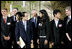 President George W. Bush and Japanese Prime Minister Yasuo Fukuda speak with United States J-8 representative Manogna Manne of Pleasanton, Calif., a member of the J-8 young leaders from the Group of Eight countries, attending the 2008 G-8 Summit in Toyako, Japan.