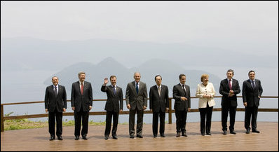 With Lake Toya as a backdrop, leaders of the Group of Eight pose for the official family photograph Tuesday, July 8, 2008, in Toyako, Japan.