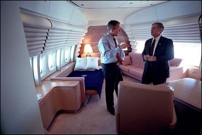 President George W. Bush meets with his Chief of Staff Andy Card in the President.s bedroom aboard Air Force One Sept. 11, 2001.