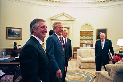 President George W. Bush meets with Chief of Staff Andy Card, CIA Director Nominee Porter Goss and Vice President Dick Cheney in the Oval Office Aug. 10, 2004. 