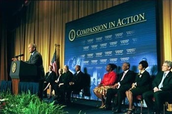 President George W. Bush discusses the progress and accomplishments of the Faith-Based and Community Initiatives in Washington, D.C., Tuesday, June 1, 2004.