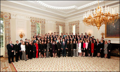 President George W. Bush and Vice President Dick Cheney pose with the Spring 2005 class of White House Interns in the State Dining Room April 28, 2005.