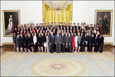President George W. Bush and Vice President Dick Cheney pose with the Spring 2008 White House Interns in the East Room, April 28, 2008.