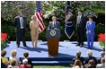 President George W. Bush discusses the economy in the Rose Garden Tuesday, April 15, 2003. Accompanying President Bush on stage are, from left, small business owners Tim Barrett, Christine Bierman, Frank Fillmore and Karla Aaron.