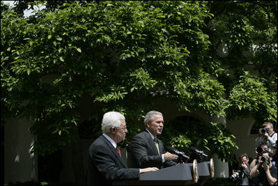 President George W. Bush and President Mahmoud Abbas of the Palestinian Authority, respond to questions during a joint press availability Thursday, May 26, 2005, in the Rose Garden of the White House.