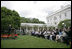 President George W. Bush addresses 200 exchange students from the program in the Rose Garden Monday, June 13, 2005. Living with host families for one year, the students come from mostly Muslim countries. "I think your generation is going to help shape one of the most exciting periods of history in the broader Middle East and the world," said the President. "It's a period of time when the hope of liberty is spreading to millions." 