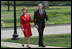 President and Laura Bush return to the White House after attending the dedication of the Abraham Lincoln Presidential Library and Museum Tuesday, April 19, 2005. 
