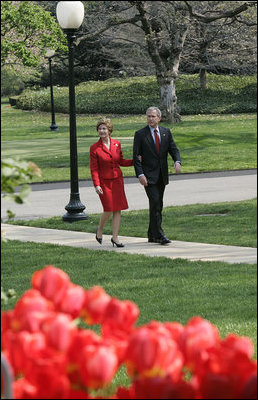 President and Laura Bush return to the White House after attending the dedication of the Abraham Lincoln Presidential Library and Museum Tuesday, April 19, 2005. 
