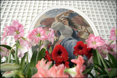 Amaryllis bloom at the feet of Constantino Brumidi’s 1869 painting, “Union,” in the West Garden Room. The painting, and a companion piece titled, “Liberty,” was originally installed on the ceiling White House Entrance Hall.