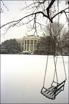 A blanket of snow covers the South Lawn of the White House, Thursday, Dec. 5, 2002.