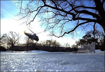 The President's helicopter, Marine One, lifts off from an icy South Lawn as he heads toward Georgia to meet with small business owners Thursday, Jeb. 20, 2003.
