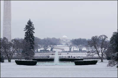 Snow covers the South Lawn of the White House looking toward the Jefferson Memorial Monday morning, Jan. 22, 2007.