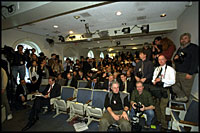 Reporters prepare for a press conference by President Bush in the James S. Brady Press Briefing Room, March 13, 2002.