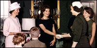 Jacqueline Kennedy greets the wives of astronauts, America's newest heroes and explorers, in the Green Room May 8, 1961. 