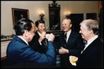 President Ronald Reagan hosts former Presidents Ford, Nixon and Carter as they share a laugh in the Blue Room October 8, 1981. Since the opening of the White House in 1800, presidents and first ladies have used the Blue Room to formally receive and greet guests.
